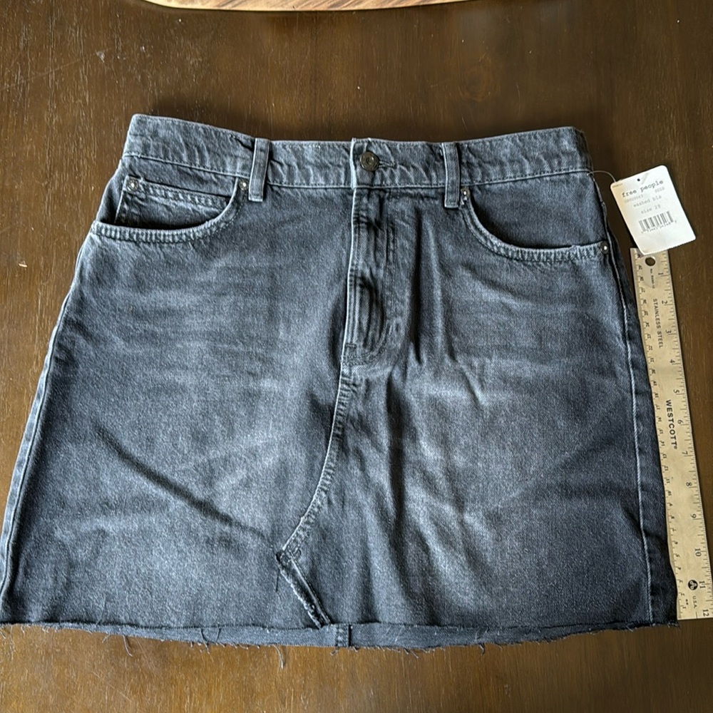 Free People sz 29 raw edge “washed black” color, denim mini skirt with tag